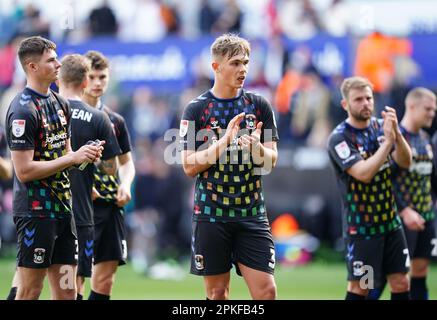 Coventry City's Callum Doyle (centre) applauds the fans following the Sky Bet Championship match at the Swansea.com Stadium, Wales. Picture date: Friday April 7, 2023. Stock Photo