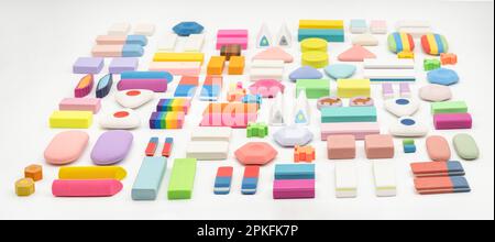 various shapes and colors of erasers arranged isolated on white background Stock Photo