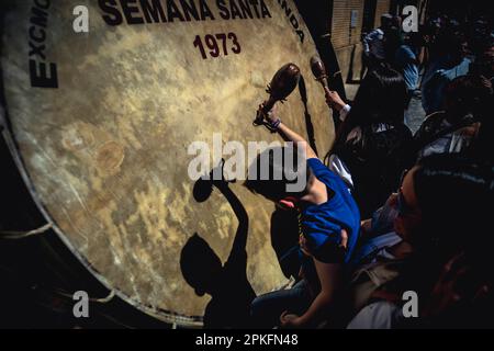 A boy plays a drum during an Easter Holy Week procession in Castilla y Leon, Spain