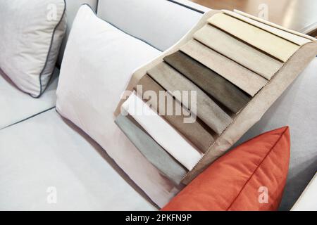 Fabric samples of upholstery sofa in the store Stock Photo