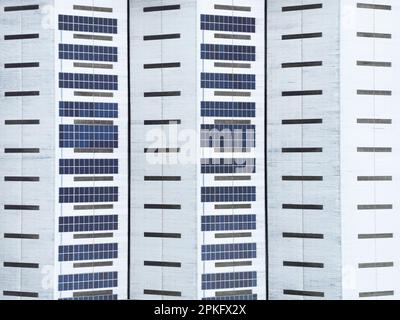 Abstract, top down view of a well-known warehouse and distribution centre showing solar panels on part of the warehouse roofs. Stock Photo