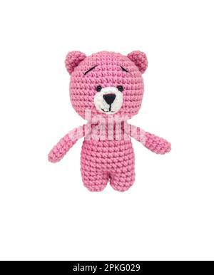 Teddy bear knitted crochet isolate on a white background. Selective focus. Baby. Stock Photo