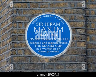 Blue plaque at Hatton House, 57d Hatton Garden, where Sir Hiram Maxim designed and manufactured the Maxim Gum, Holborn, London, EC1N, UK. Stock Photo
