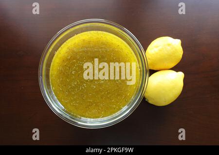 Lemon marinade, whole lemons, squeezed lemons, food blog, fruit marinade with no background Stock Photo