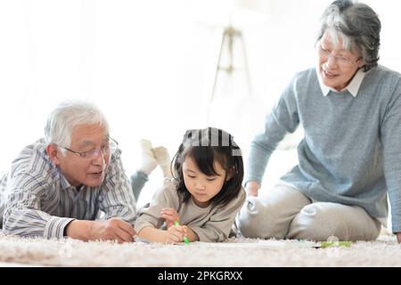Grandparents and grandchildren drawing Stock Photo