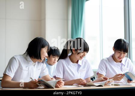 A nursing student taking a class in a classroom Stock Photo