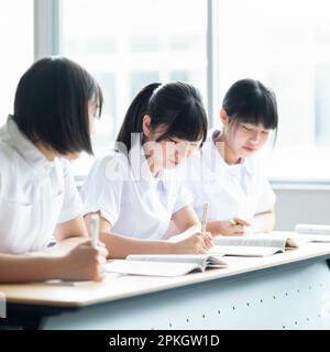 Nursing students taking a class in a classroom Stock Photo