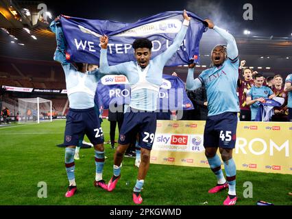 Burnley's Nathan Tella, Vitinho and Michael Obafemi celebrate promotion to the Premier League following the Sky Bet Championship match at the Riverside Stadium, Middlesbrough. Picture date: Friday April 7, 2023. Stock Photo