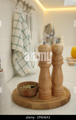 Wooden Salt And Pepper Shakers With Bay Leaves On Light Table, Closeup.  Spice Mill Stock Photo, Picture and Royalty Free Image. Image 174031811.