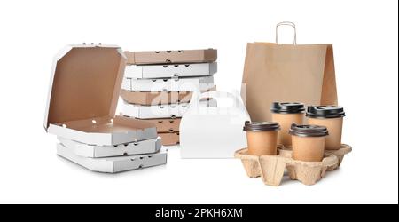 Set with different cardboard boxes for pizza, paper bag and takeaway cups on white background Stock Photo
