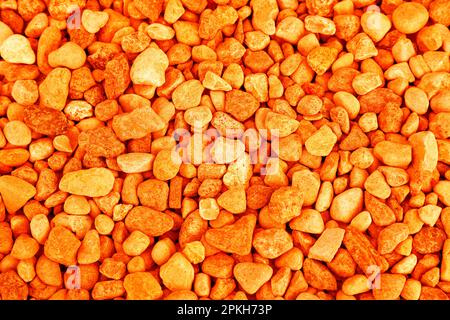 Pile of orange stones as background, top view Stock Photo
