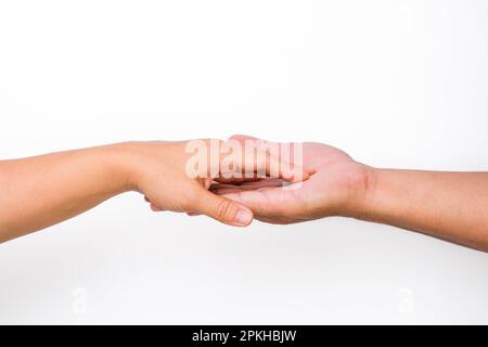 Hands of man and woman reaching to each other. Two people holding hands on white background. That can mean helping, caring, protecting, loving, caring Stock Photo