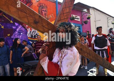 Atlixco, Mexico. 7th Apr, 2023. A person representing Jesus, takes part during the Representation of the Stations of the Cross on Good Friday as part of the Holy Week Celebrations. on April 7, 2023 in Atlixco, Mexico. (Credit Image: © Carlos Tischler/eyepix via ZUMA Press Wire) EDITORIAL USAGE ONLY! Not for Commercial USAGE! Stock Photo