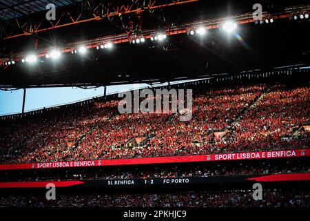 Lisboa, Portugal. 07th Apr, 2023. SL Benfica supporters in action during the Liga Portugal Bwin match between SL Benfica and FC Porto at Estadio da Luz in Lisbon.(Final score: SL Benfica 1 - 2 FC Porto) Credit: SOPA Images Limited/Alamy Live News Stock Photo