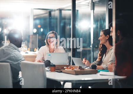 They bring their best to every project. colleagues collaborating on a project in a modern office. Stock Photo