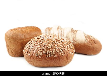 Assortment of different types of bread isolated on a white background. Top view Stock Photo