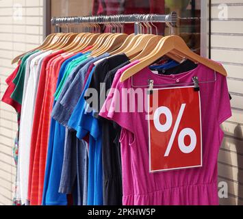 clearance sale clothes rack with a selection of fashion for women