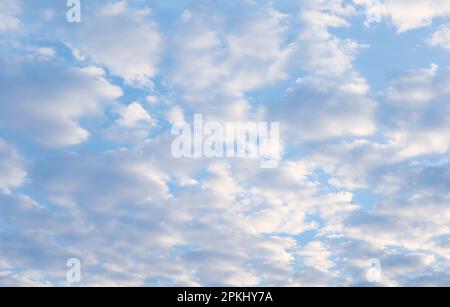 Amazing Altocumulus Clouds Lined Up on Sunny Sky Stock Photo