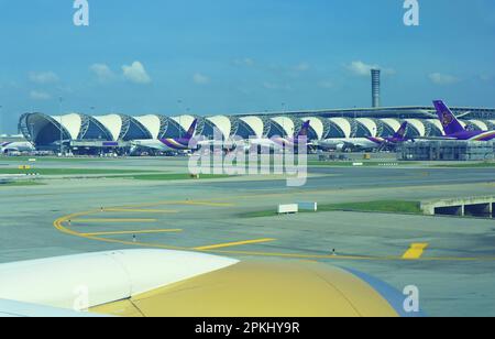 Suvarnabhumi Airport or Bangkok International Airport as seen from the landed aircraft, Samut Prakan Province, Thailand Stock Photo