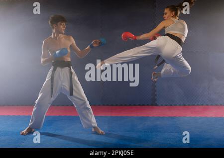 A man in a white karate uniform poses for a photo · Free Stock Photo
