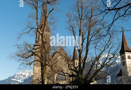 Interlaken, Switzerland, February 10, 2023 Historic old catholic church in the city center Stock Photo