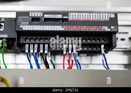 Electrical circuit in electrical control cabinet at industrial factory Stock Photo
