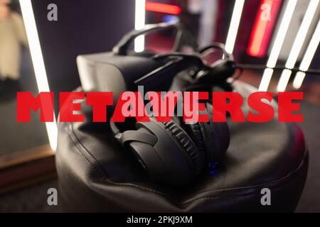 Metaverse concept. Professional headphones with microphone and vr glasses for video games and cyber sports on background. Stock Photo