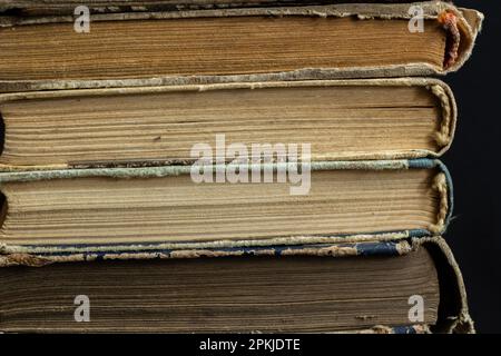 Book background. Old books in the library. Bookshelf shop, Knowledge publications literature. Bookish bookstore, Bookcrossing. Stock Photo