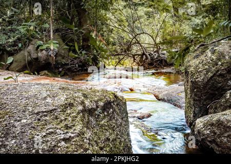 Small waterfall on the mountain trail of "Mestre Alvaro" in the municipality of Serra in Brazil. Stock Photo