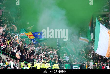 Celtic fans set off flares at Celtic Park, Glasgow. Fan safety and security issues led to the decision by Celtic and Rangers to have home supporters only for the cinch Premiership match at Parkhead and the post-split game at Ibrox at a date yet to be determined. Picture date: Saturday April 8, 2023. Stock Photo