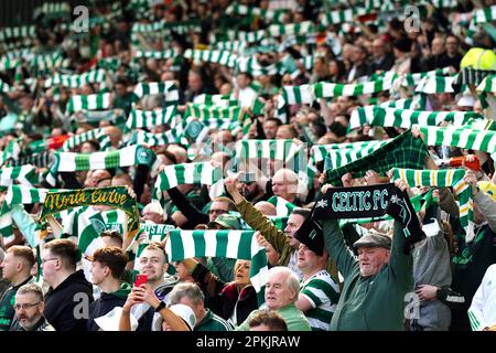 Celtic fans in the stands during the cinch Premiership match at Celtic Park, Glasgow. Fan safety and security issues led to the decision by Celtic and Rangers to have home supporters only for the cinch Premiership match at Parkhead and the post-split game at Ibrox at a date yet to be determined. Picture date: Saturday April 8, 2023. Stock Photo