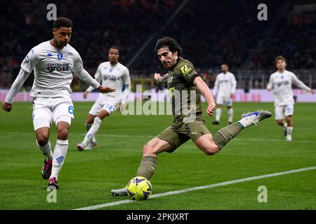 Milan, Italy. 7 April 2023. Sandro Tonali of AC Milan competes for the ball with Koni De Winter of Empoli FC during the Serie A football match between AC Milan and Empoli FC. Credit: Nicolò Campo/Alamy Live News Stock Photo