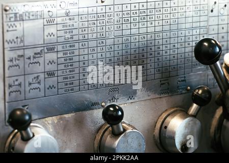 Kind of outdated metal lathe. Auxiliary table on lathe. Close-up. Stock Photo