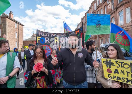 Glasgow, Scotland, UK. 8th April, 2023: The annual International Roma Day community procession through the streets of Govanhill to celebrate Romani culture and raise awareness of the issues facing Romani people. Credit: Skully/Alamy Live News Stock Photo