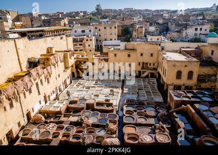 General view of vats of dye and softening agents in Chouara tannery in Fez Medina Morocco Stock Photo