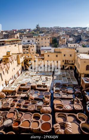 General view of vats of dye and softening agents in Chouara tannery in Fez Medina Morocco Stock Photo