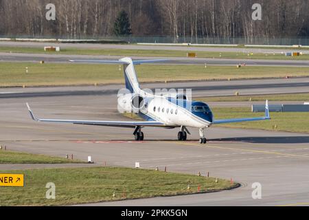 Zurich, Switzerland, January 2, 2023 Gulfstream 450 business aircraft is taxiing to its takeoff position Stock Photo