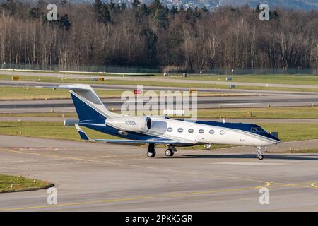 Zurich, Switzerland, January 2, 2023 Gulfstream 450 business aircraft is taxiing to its takeoff position Stock Photo