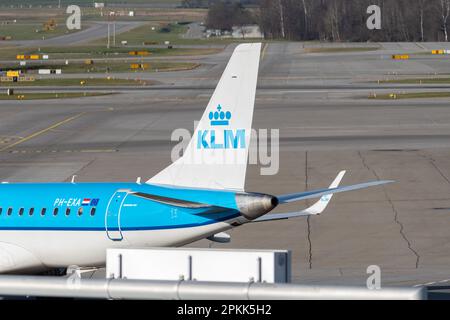 A KLM Royal Dutch Airlines Embraer E195-E2 on final approach to runway ...