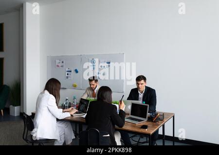 discussion of the contract between employees before the conclusion of the transaction Stock Photo