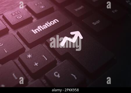 Black keyboard photo with the word "inflation" on button. Economic crisis that affects the world growth. Stock Photo