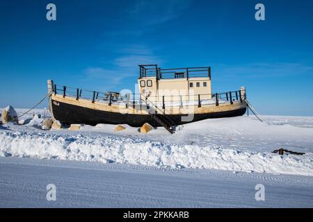 The Beluga boat at a beach on Hudson Bay in Churchill, Manitoba, Canada Stock Photo