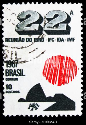MOSCOW, RUSSIA - MARCH 26, 2023: Postage stamp printed in Brazil shows Sun and Rio de Janeiro, Meeting of International Monetary Fund, Rio de Janeiro Stock Photo