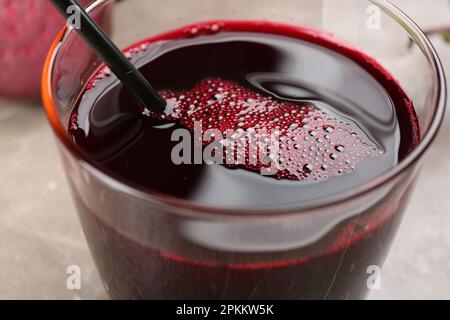 Freshly made beet juice in glass on table, closeup Stock Photo
