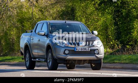 2016 MITSUBISHI L200 car travelling on an English country road Stock Photo