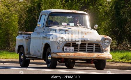 1957 CHEVROLET pick up truck travelling on an English country road Stock Photo