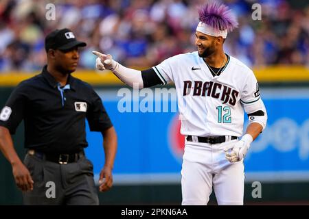 Arizona Diamondbacks left fielder Lourdes Gurriel Jr. (12) celebrates a  solo home run in the second inning during a MLB regular season game between  th Stock Photo - Alamy