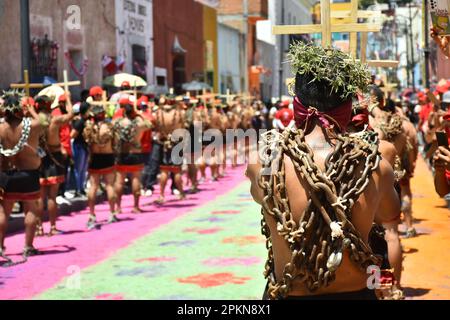 Atlixco, Mexico. 07th Apr, 2023. April 7, 2023, Atlixco, Mexico - Hooded Penitents, wearing heavy chains and cactus spines stuck to their bodies, take part in the Holy Week penitential procession The 'Engrillados' ( Shackled) procession to celebrated the Good Friday as part of holy week celebration. on April 7, 2023 in Atlixco, Mexico. (Photo by Carlos Tischler/Eyepix Group/Sipa USA) Credit: Sipa USA/Alamy Live News Stock Photo