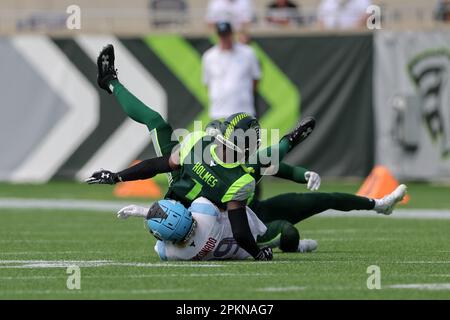 April 8, 2023: Orlando Guardians C.J. HOLMES (1) gets tackled by Arlington Renegades wide receiver BRANDON ARCONADO (19) during the Orlando Guardians vs Arlington Renegades XFL game at Camping World Stadium in Orlando, Fl on April 8, 2023. (Credit Image: © Cory Knowlton/ZUMA Press Wire) EDITORIAL USAGE ONLY! Not for Commercial USAGE! Stock Photo