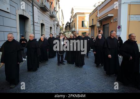April 7, 2023, Pagani, Salerno, Italy: Pagani, Salerno, Italy - April 07, 2023:The confreres of the Brotherhood of the Most Holy Virgin of Sorrows seen during the procession.On Good Friday afternoon, a procession of faithful of the various religious archconfraternities, accompanies the statue of the Dead Christ and the Virgin of Sorrows through the streets of the historic center. By singing ancient passages and praying they remember the pain of Our Lady for the death of her son Jesus. (Credit Image: © Pasquale Senatore/Pacific Press via ZUMA Press Wire) EDITORIAL USAGE ONLY! Not for Commercial Stock Photo